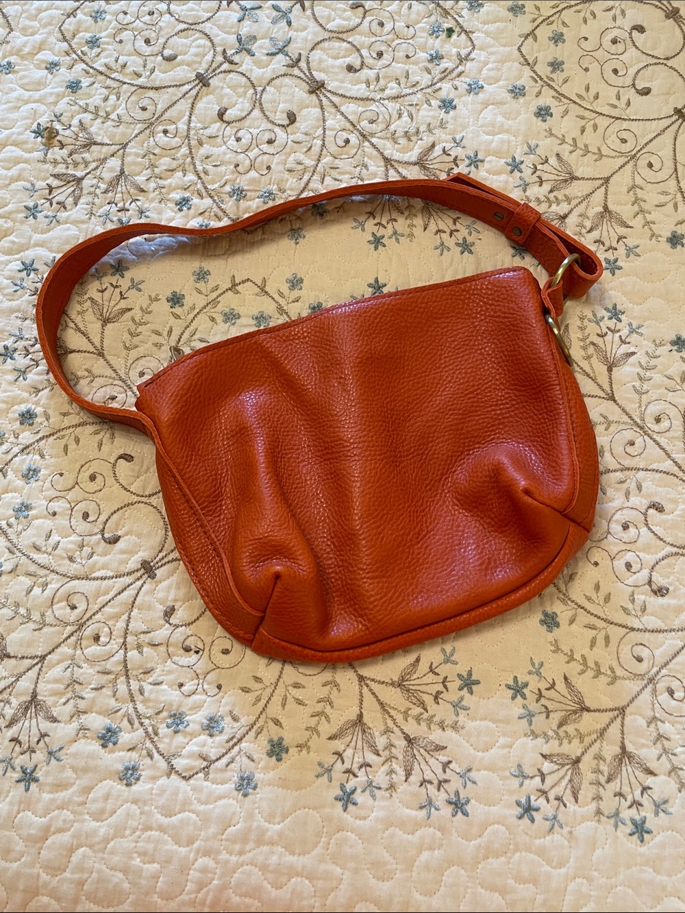 Pebbled Orange Leather Shoulder Bag with Minimal Metal Accent - Picture 2 of 3